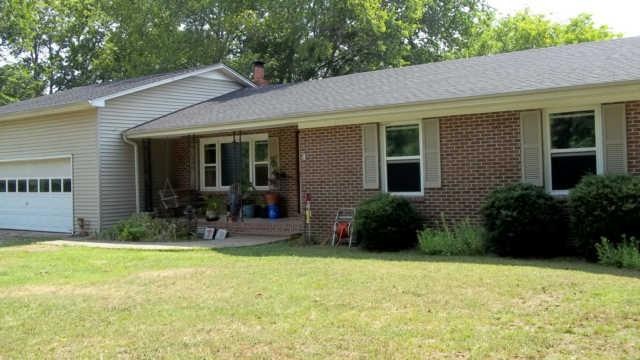 Great brick home  in the country with privacy galore!