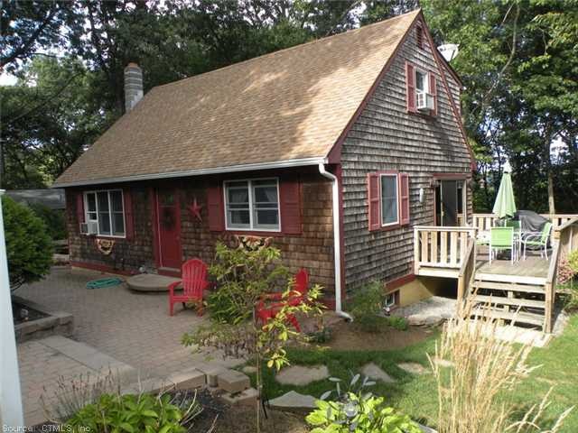 Exterior Front. Nice Cape with lovely landscaping