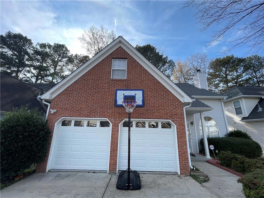 View of front of property with a garage