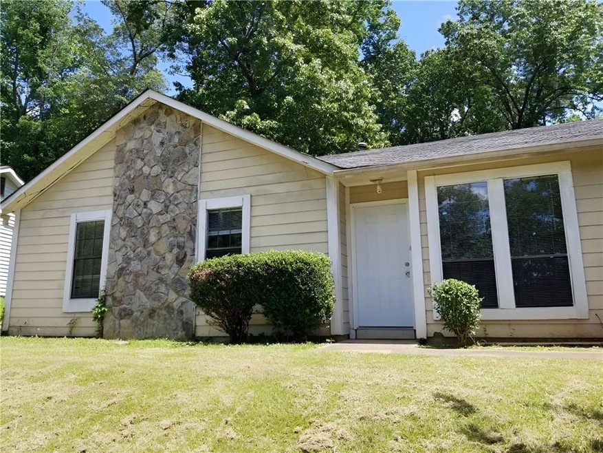 View of front of property with a front yard