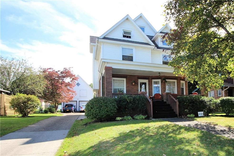 Beautiful brick home with inviting front porch.