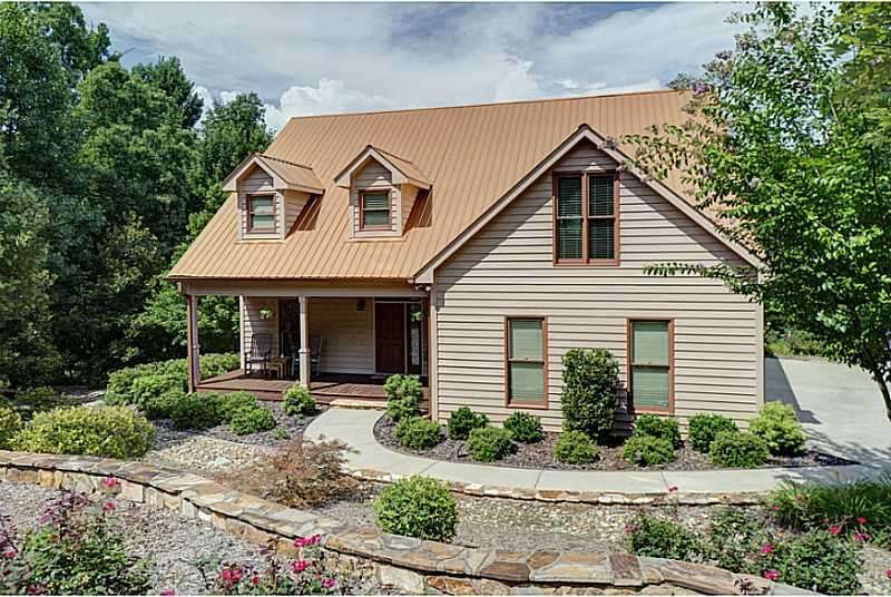 Exterior Front. Professionally landscaped grounds,