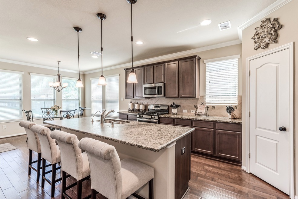 Your spacious kitchen has an island fit for entertaining so many guests!
