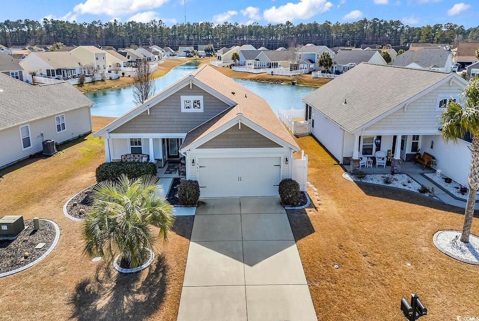 View of front of home with a residential view, cov