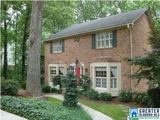 Stately two-story three sides brick home situated 