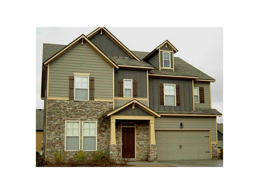 Exterior Front. Stunning Exterior with A Stone Acc