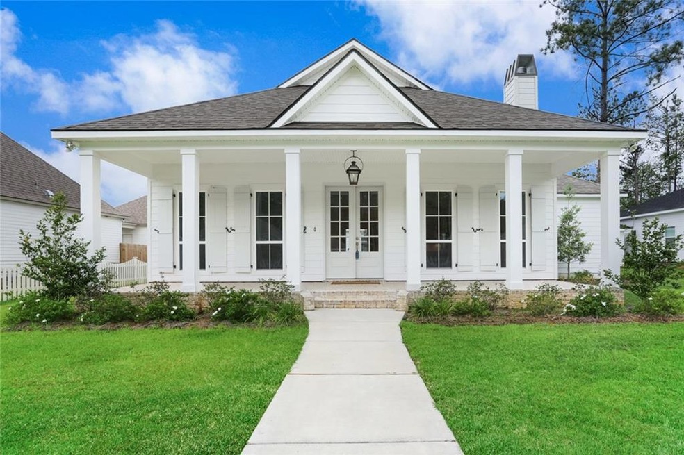 Welcome home! Come relax on this front porch with