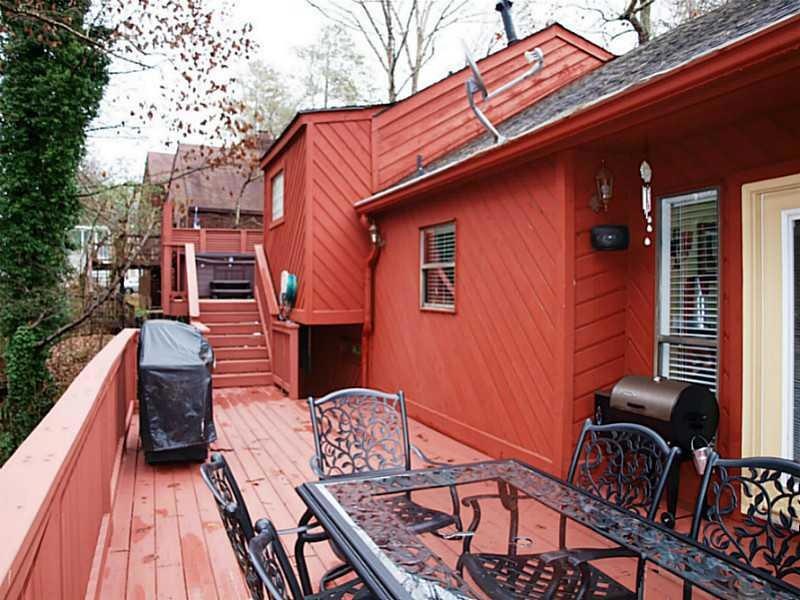 Exterior Back. Large Deck off Dining area leading 
