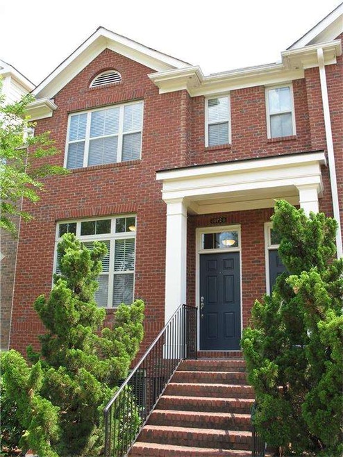 Gorgeous brick townhome in the heart of Johns Cree