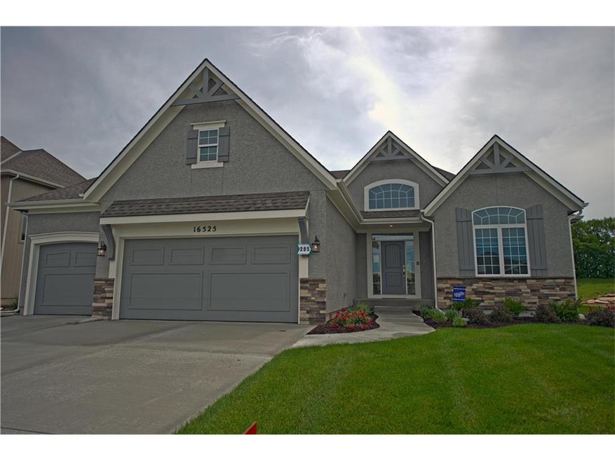 Cypress II Model Home Front. Beautiful Stone and S