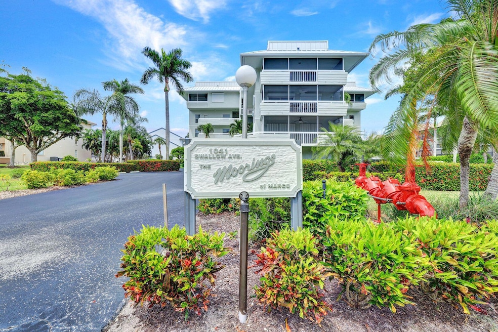 1041 Swallow Ave unit 202, Marco Island, FL 34145 - photo 1
