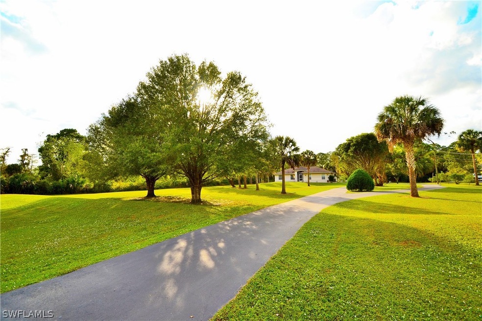 1311 19th St SW, Naples, FL 34117 - photo 1