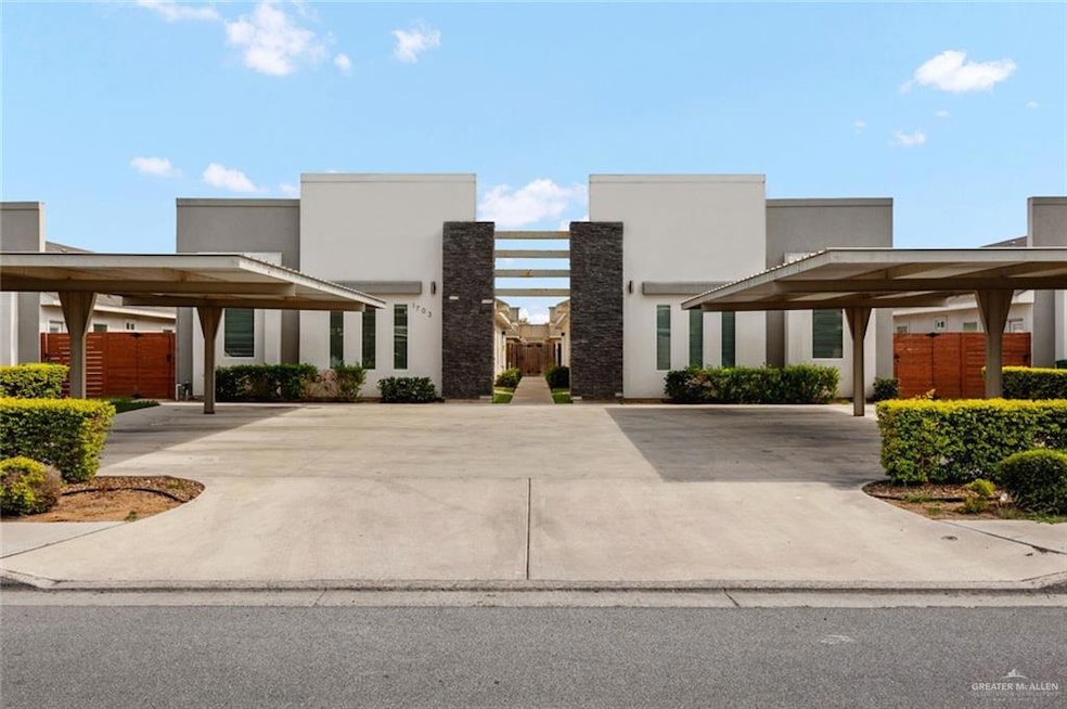 View of front facade featuring a carport