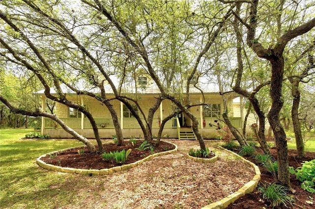 BEAUTIFULLY LANDSCAPED HOME ON 10 ACRES