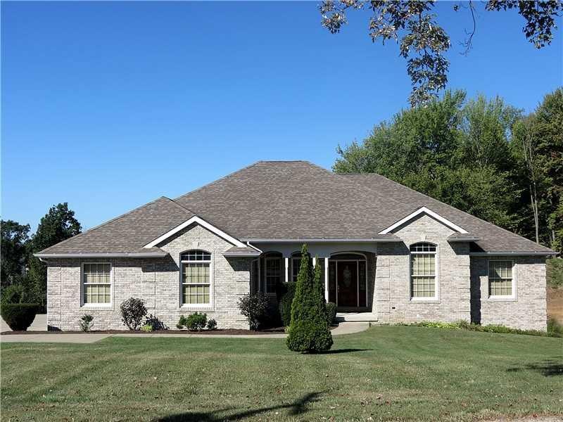 Exterior Front. Exceptional custom built all brick