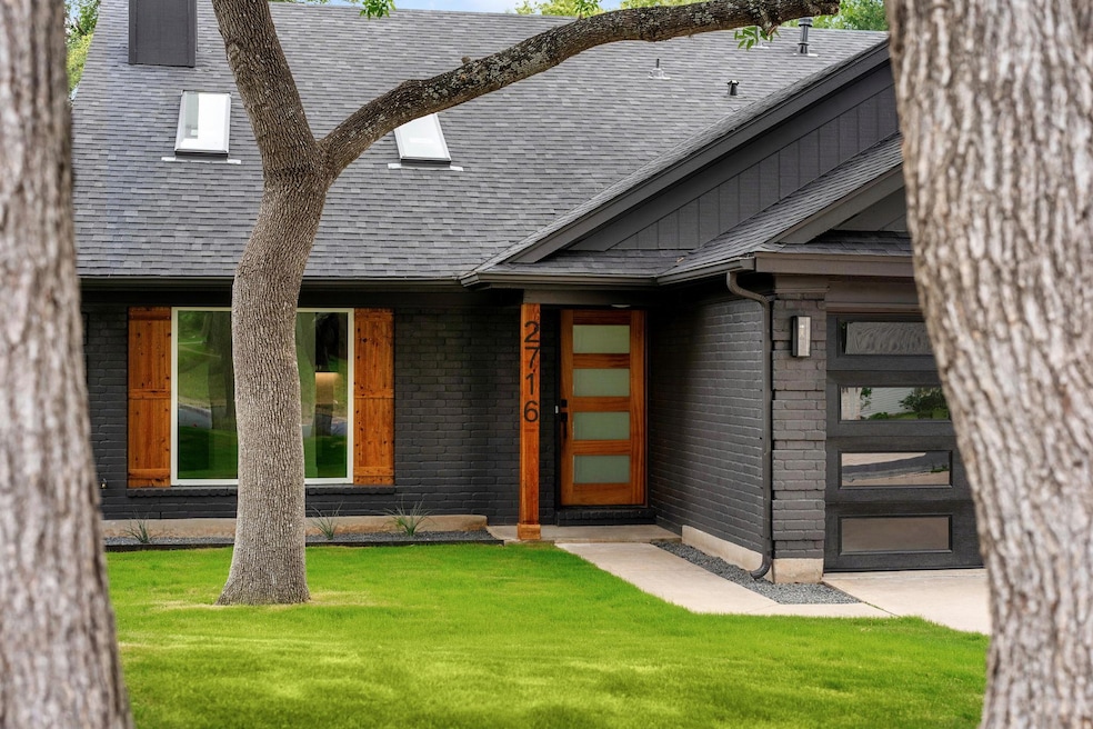 View of front of property featuring brick siding,