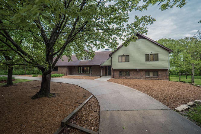 1150 S Cedar Grove Blvd-small-001-2-Fron