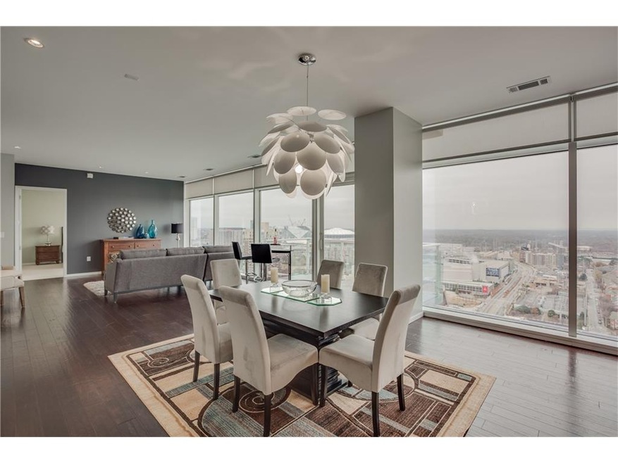 The dining area between the living room and kitche