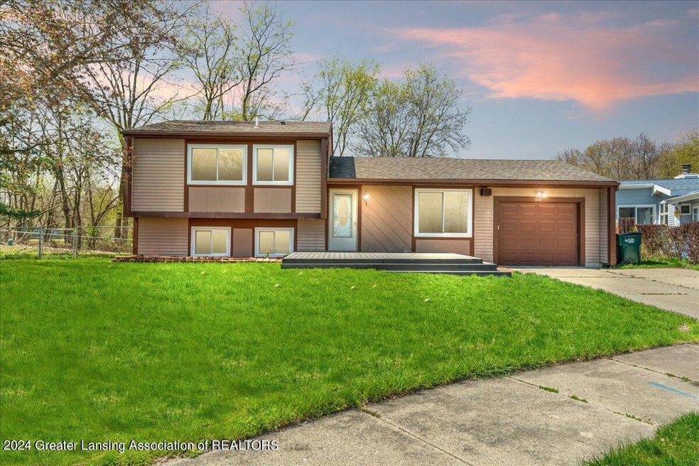 319 Lama Cir, Lansing, MI 48911 - photo 1