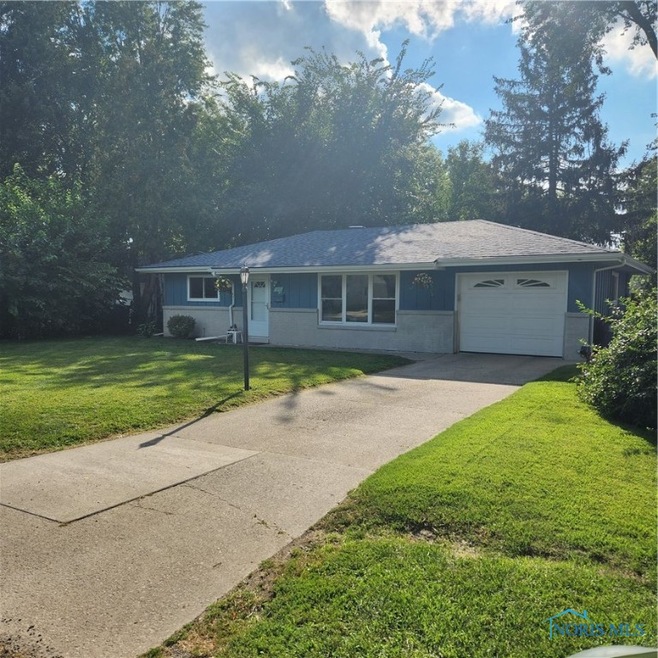 updated ranch, cement drive attached garage