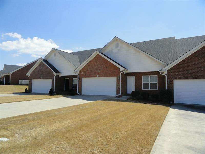 Charming brick patio home in quiet swim neighborho