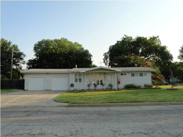 Front View of home. Large Corner Lot.