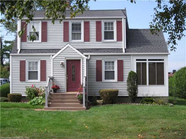 Exterior Front. New Vinyl siding and front door