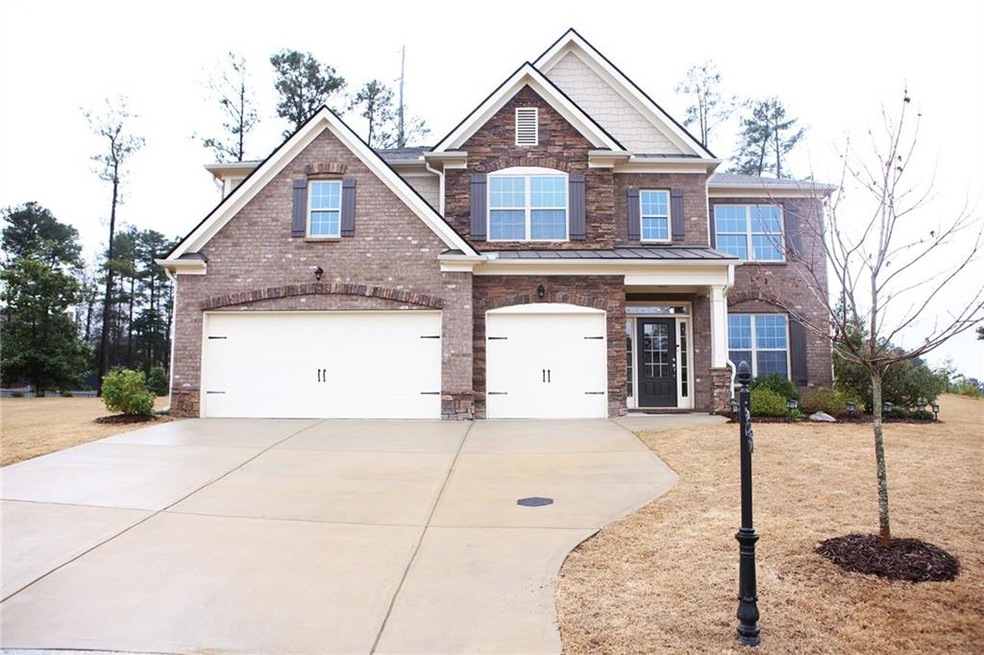 3 side brick, 3 car garage, level yard