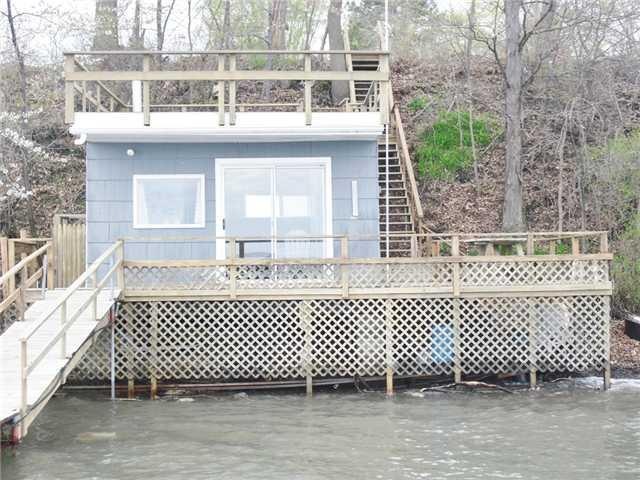 Exterior Front. Have boat , need dock , stop HERE.