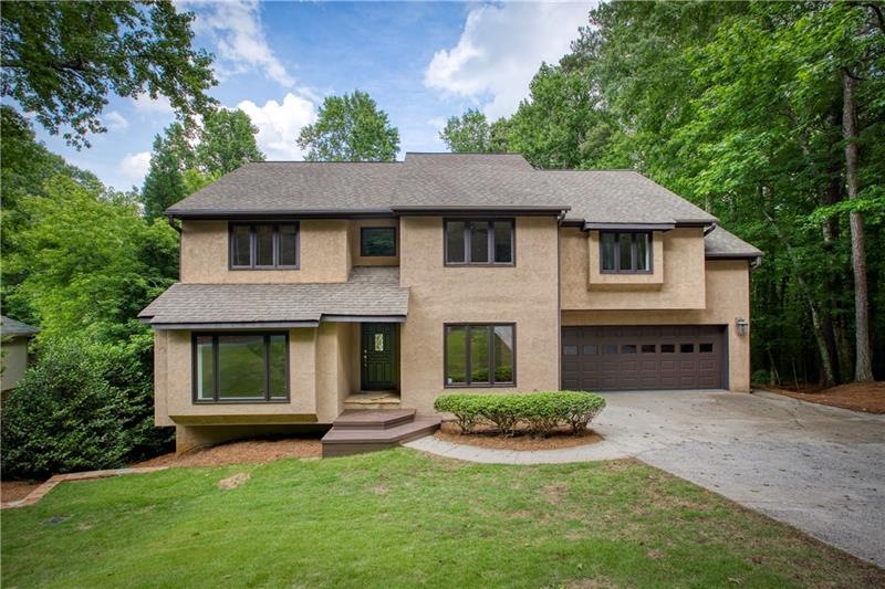 Open & airy hard coat stucco home in Chimney Lakes