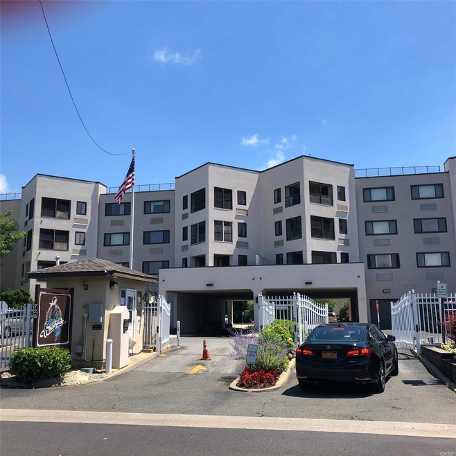 Wharfside Condominiums unit 108, Freeport, NY 11520 - photo 1