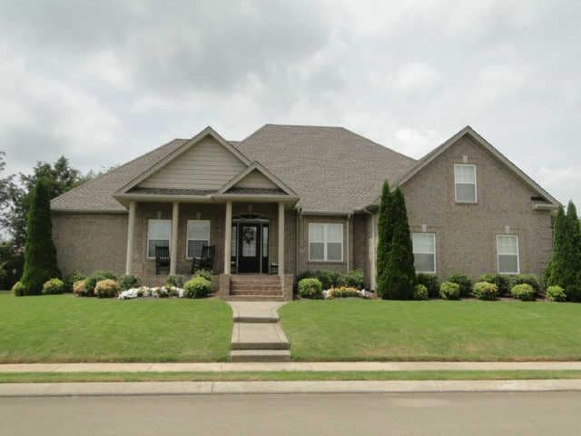 What a lovely home overlooking an 18 hole golf course.  Newly landscaped and new sod yard.