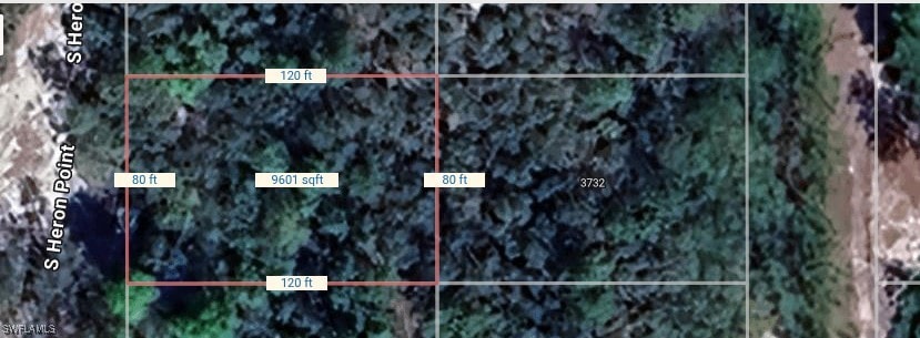 Aerial map of property and surrounding area featur