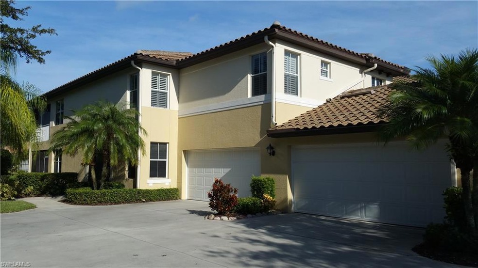 View of front of property with stucco siding and concrete driveway