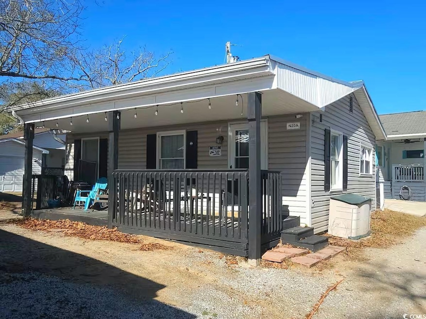 View of front of property featuring porch/deck area