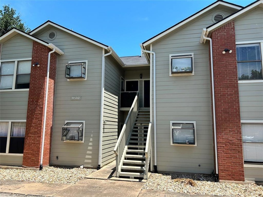 Back of house featuring stairway