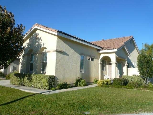 Great curb appeal. Bright corner lot. 2-car garage