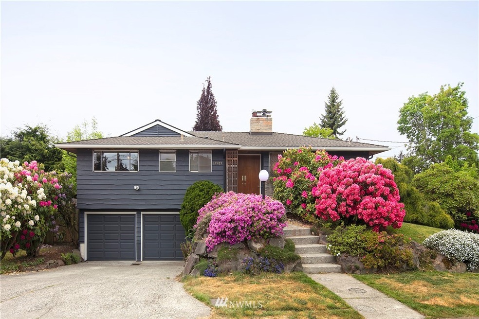 Classic Mid Century home on a large corner lot. What a beauty!