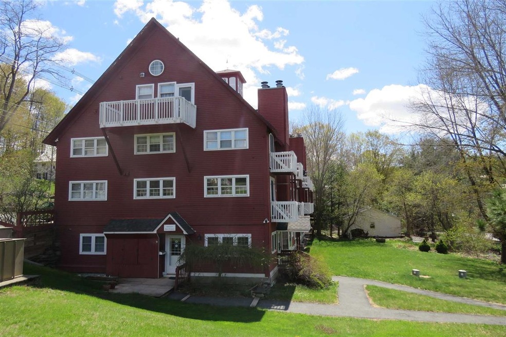 The corner unit overlooks the Ottaqauquechee River