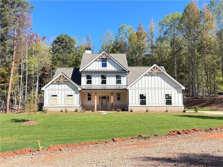 Modern farmhouse style home with a porch and a fro