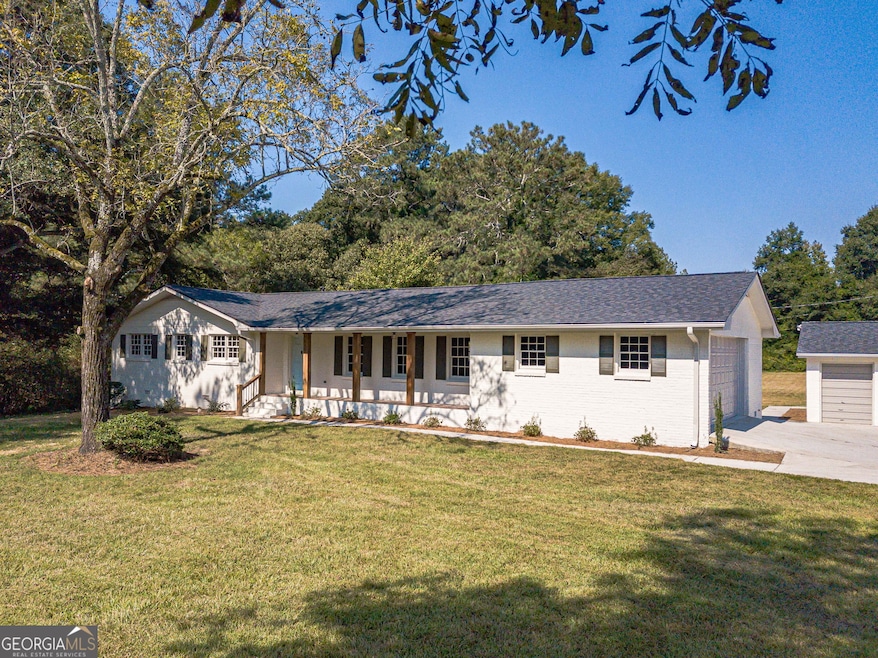 3467 Tom Brewer Rd, Loganville, GA 30052 - photo 1