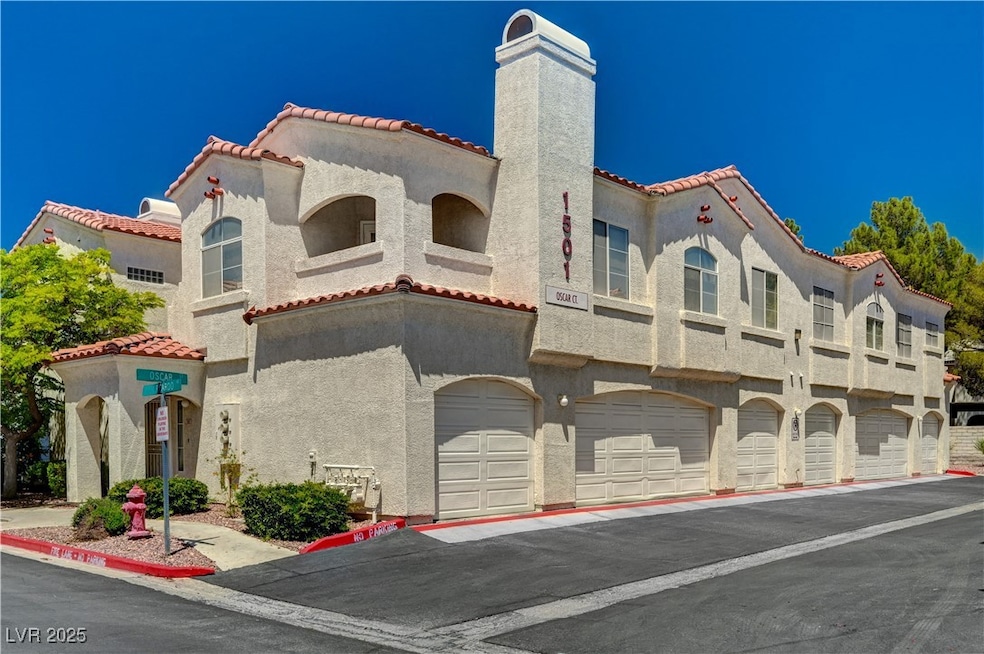 View of property featuring a garage