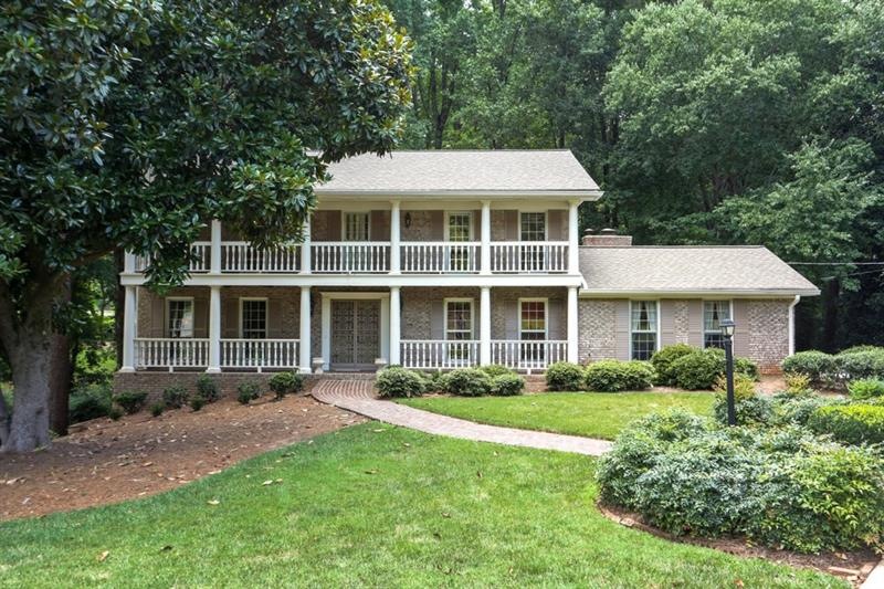 Traditional four sides brick home on large, level 