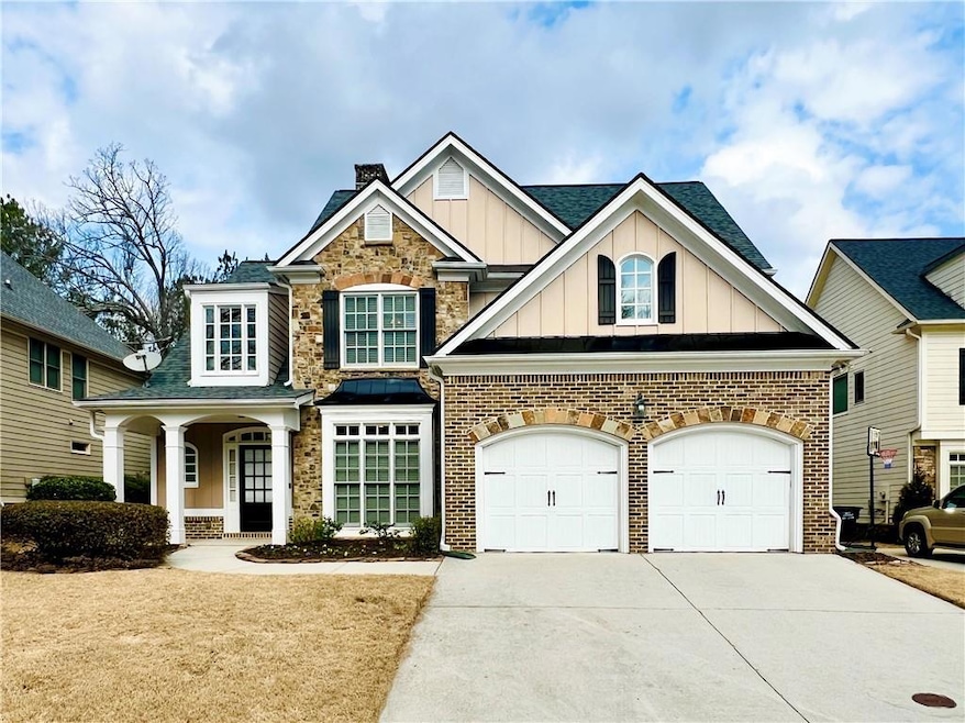 Craftsman inspired home featuring a garage