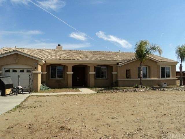 Single story with a three car garage.