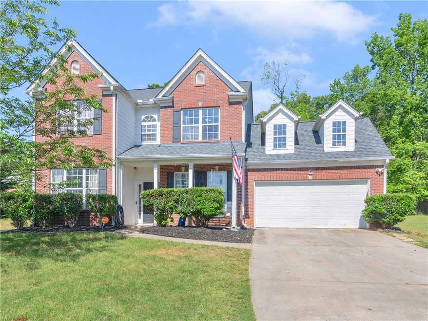 View of front of house featuring a front lawn and 