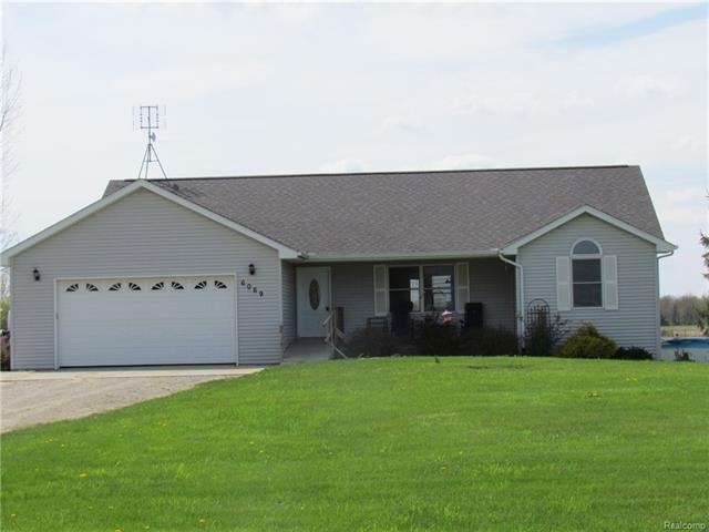 6069 Slattery Road, North Branch, MI.  48461