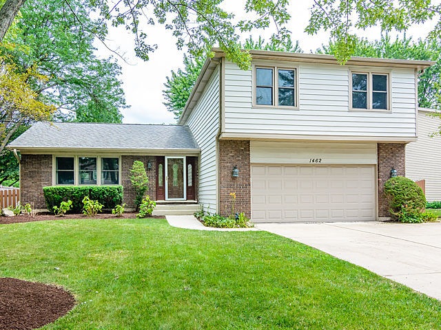 Professionally landscaped -- insulated siding & ne