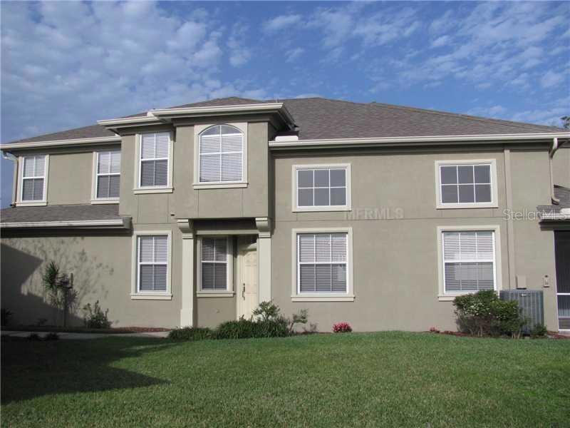 Exterior Front - Side view with front entrance.