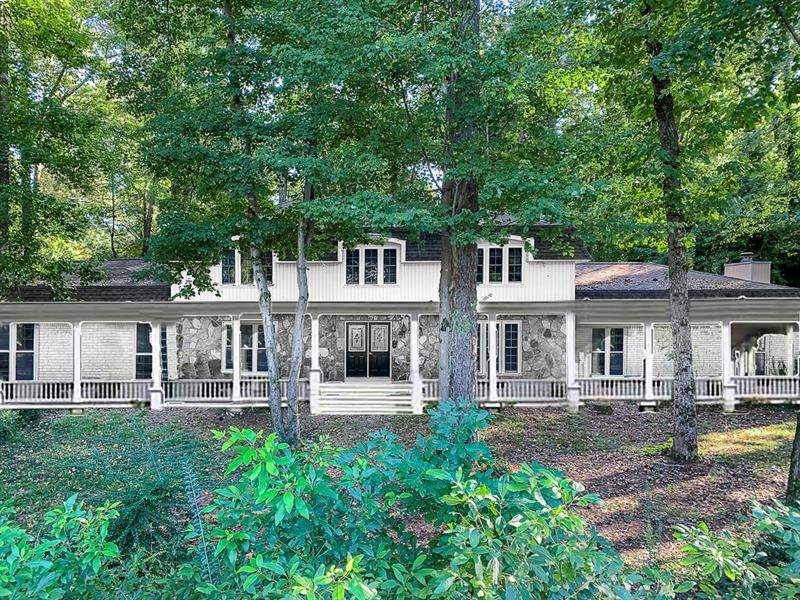 Spacious French Colonial Farmhouse with Mansard-ro